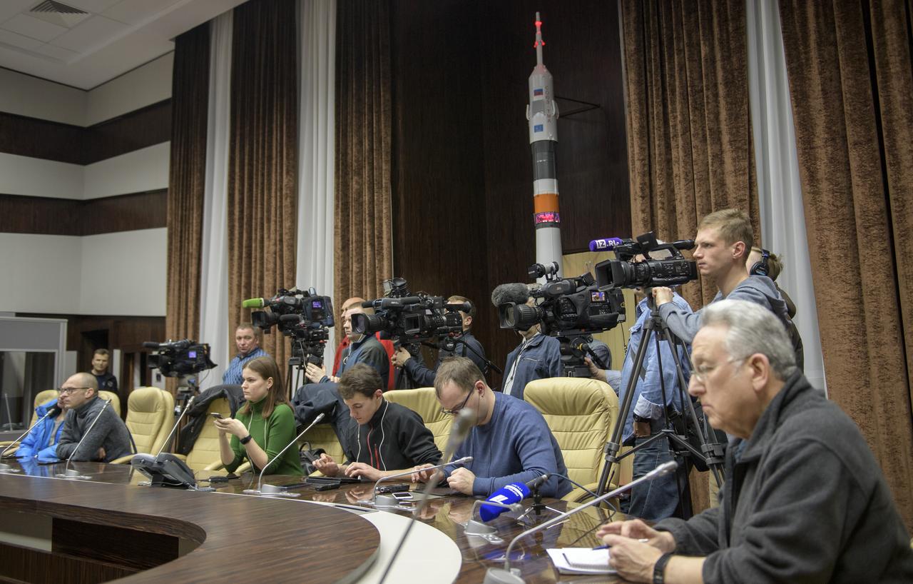 Members of the media are seen during a Expedition 59 post-docking press conference, Friday, March 15, 2019 at the Baikonur Hotel in Baikonur, Kazakhstan. Photo Credit: (NASA/Bill Ingalls)