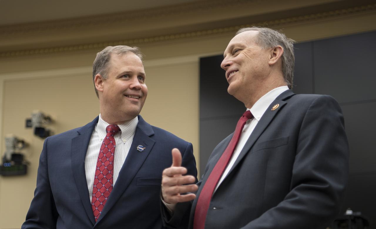 NASA Administrator Jim Bridenstine, left, speaks with Congress members just before testifying during a House Committee on Science, Space, and Technology hearing to review the Fiscal Year 2020 budget request for the National Aeronautics and Space Administration, Tuesday, April 2, 2019 at the Rayburn House Office Building in Washington. Photo Credit: (NASA/Aubrey Gemignani)
