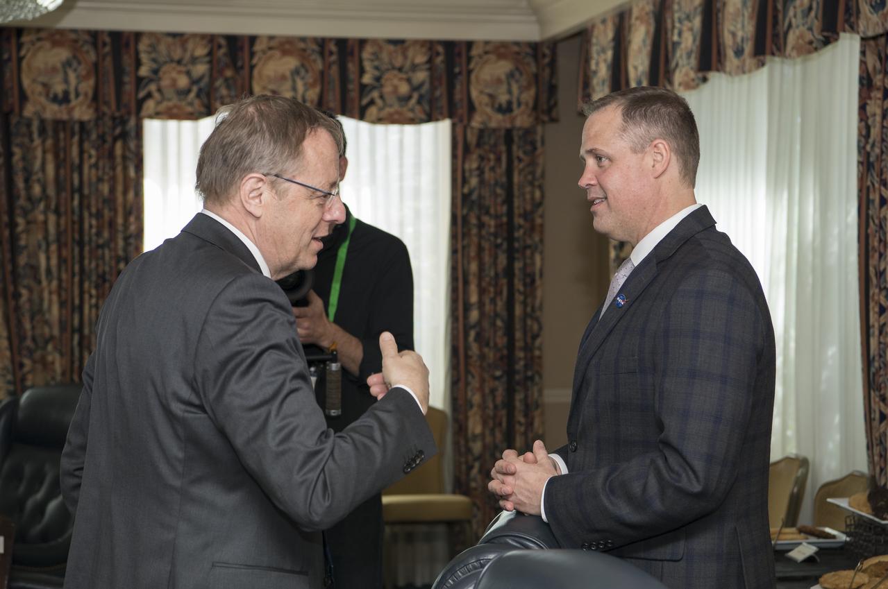NASA Administrator Jim Bridenstine, right, speaks with Johann-Dietrich Wörner, director general of ESA (European Space Agency), about NASA’s plans to land humans on the Moon by 2024 and prospective collaboration in human and robotic lunar and Mars exploration activities, at the Space Symposium, Monday, April 8, 2019 in Colorado Springs, Colorado, They also discussed their continued successful cooperation on the International Space Station and the service module for the Orion spacecraft that will take us to the Moon and beyond. Photo Credit: (NASA/Aubrey Gemignani)