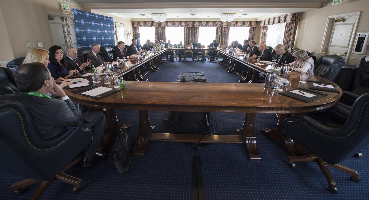 NASA Administrator Jim Bridenstine, seventh from left, speaks with Johann-Dietrich Wörner, director general of ESA (European Space Agency), fourth from right, about NASA’s plans to land humans on the Moon by 2024 and prospective collaboration in human and robotic lunar and Mars exploration activities, at the Space Symposium, Monday, April 8, 2019 in Colorado Springs, Colorado, They also discussed their continued successful cooperation on the International Space Station and the service module for the Orion spacecraft that will take us to the Moon and beyond. Photo Credit: (NASA/Aubrey Gemignani)