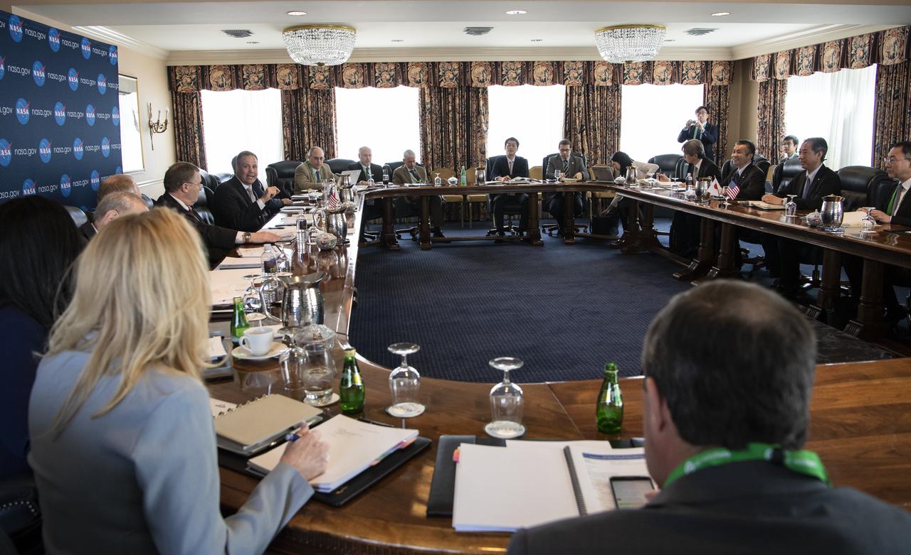 NASA Administrator Jim Bridenstine, fifth from left, speaks with Japan Aerospace Exploration Agency (JAXA) President, Hiroshi Yamakawa, second from right, about opportunities to work together in human and robotic exploration at the lunar surface and around the Moon, at the Space Symposium, Monday, April 8, 2019 in Colorado Springs, Colorado. They also discussed the two agencies’ asteroid sample return missions, OSIRIS-REx AND Hayabusa-2, and how they are looking forward to sharing the data and results from those missions. Photo Credit: (NASA/Aubrey Gemignani)