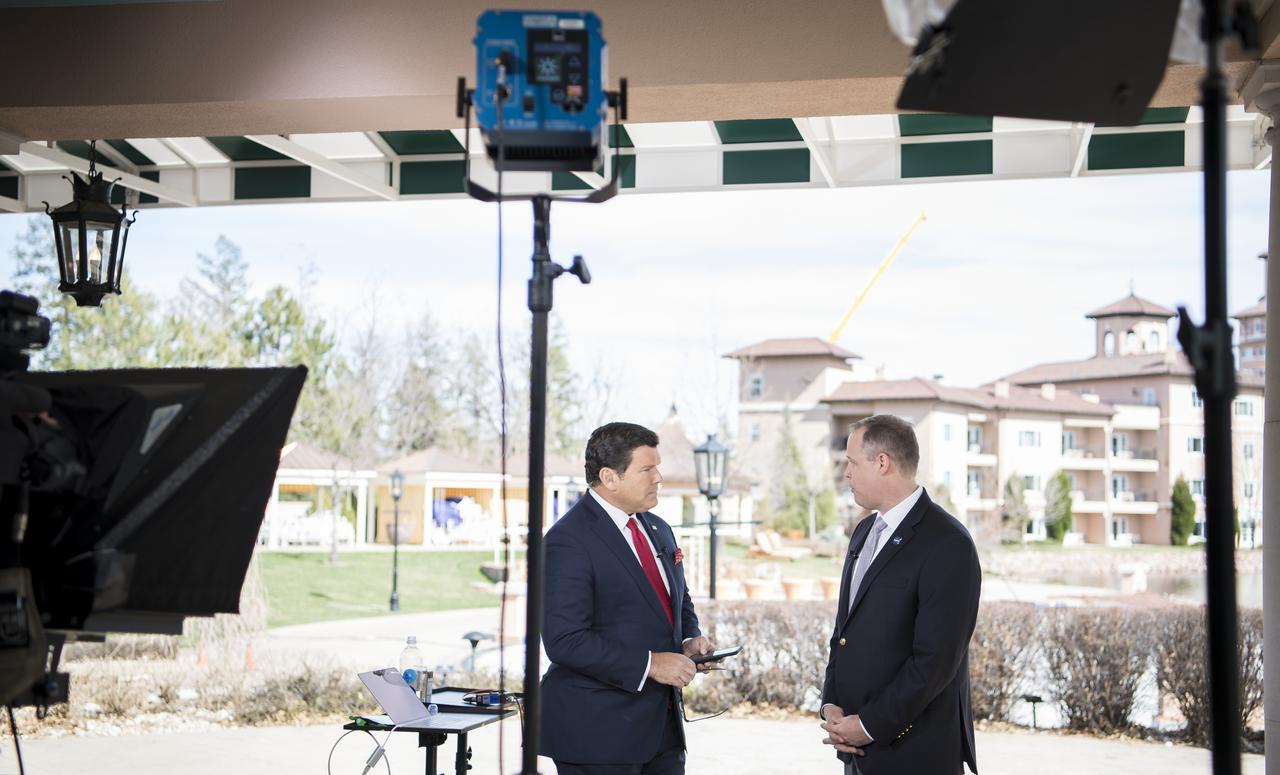 NASA Administrator Jim Bridenstine is interviewed by Bret Baier of Fox News at the Space Symposium, Monday, April 8, 2019 in Colorado Springs, Colorado. Photo Credit: (NASA/Aubrey Gemignani)