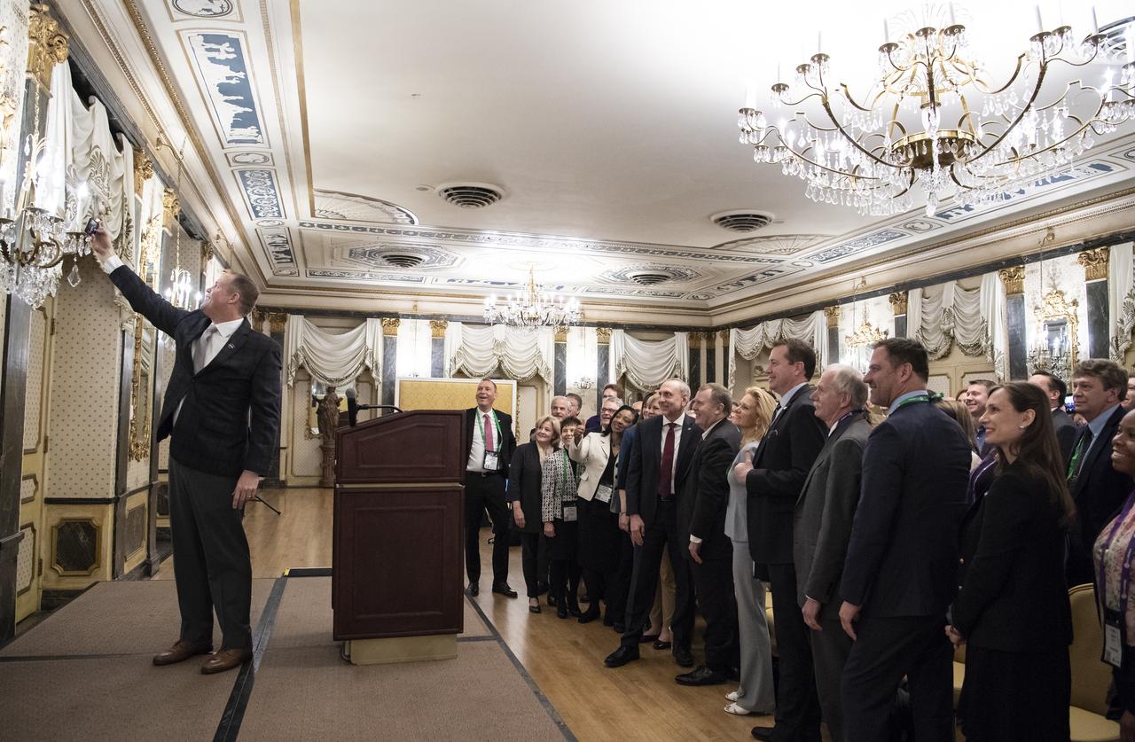 NASA Administrator Jim Bridenstine takes a selfie with NASA staff at an agency meeting at the Space Symposium, Monday, April 8, 2019, at the Broadmoor Hotel in Colorado Springs, Colorado. NASA officials from NASA centers around the country were in attendance. Photo credit: (NASA/Aubrey Gemignani)