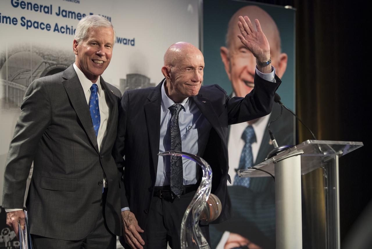 General William Shelton awards General Thomas Patten Stafford, former NASA astronaut, Air Force officer and test pilot the General James E. Hill Lifetime Achievement Award, at the Space Symposium, Tuesday, April 9, 2019, at Broadmoor Hall in Colorado Springs, Colorado. Former and current NASA Administrators were in attendance. Photo credit: (NASA/Aubrey Gemignani)