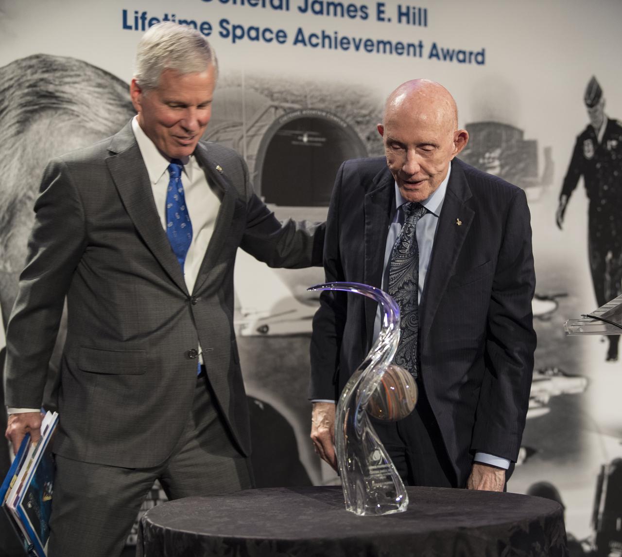 General William Shelton awards General Thomas Patten Stafford, former NASA astronaut, Air Force officer and test pilot the General James E. Hill Lifetime Achievement Award, at the Space Symposium, Tuesday, April 9, 2019, at Broadmoor Hall in Colorado Springs, Colorado. Former and current NASA Administrators were in attendance. Photo credit: (NASA/Aubrey Gemignani)