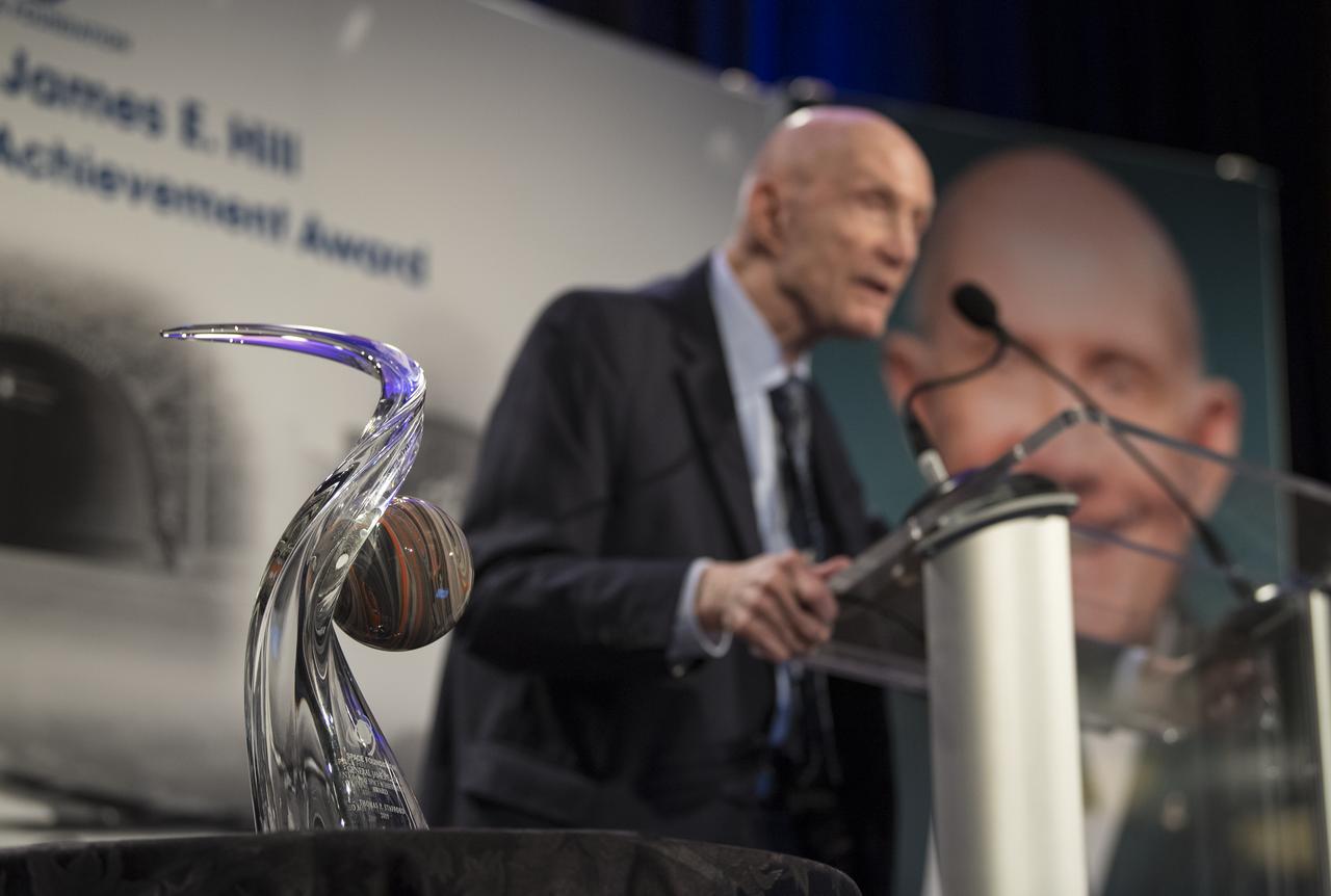 The General James E. Hill Lifetime Achievement Award is seen as General Thomas Patten Stafford, former NASA astronaut, Air Force officer and test pilot accepts the award at the Space Symposium, Tuesday, April 9, 2019, at Broadmoor Hall in Colorado Springs, Colorado. Former and current NASA Administrators were in attendance. Photo credit: (NASA/Aubrey Gemignani)