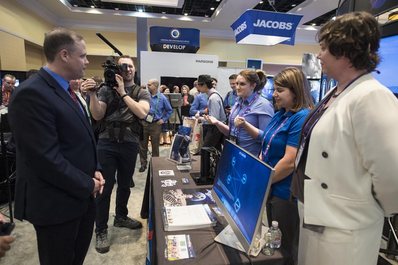 NASA Administrator Jim Bridenstine tours the NASA exhibit at the Space Symposium, Tuesday, April 9, 2019, at Broadmoor Hall in Colorado Springs, Colorado. Photo credit: (NASA/Aubrey Gemignani)