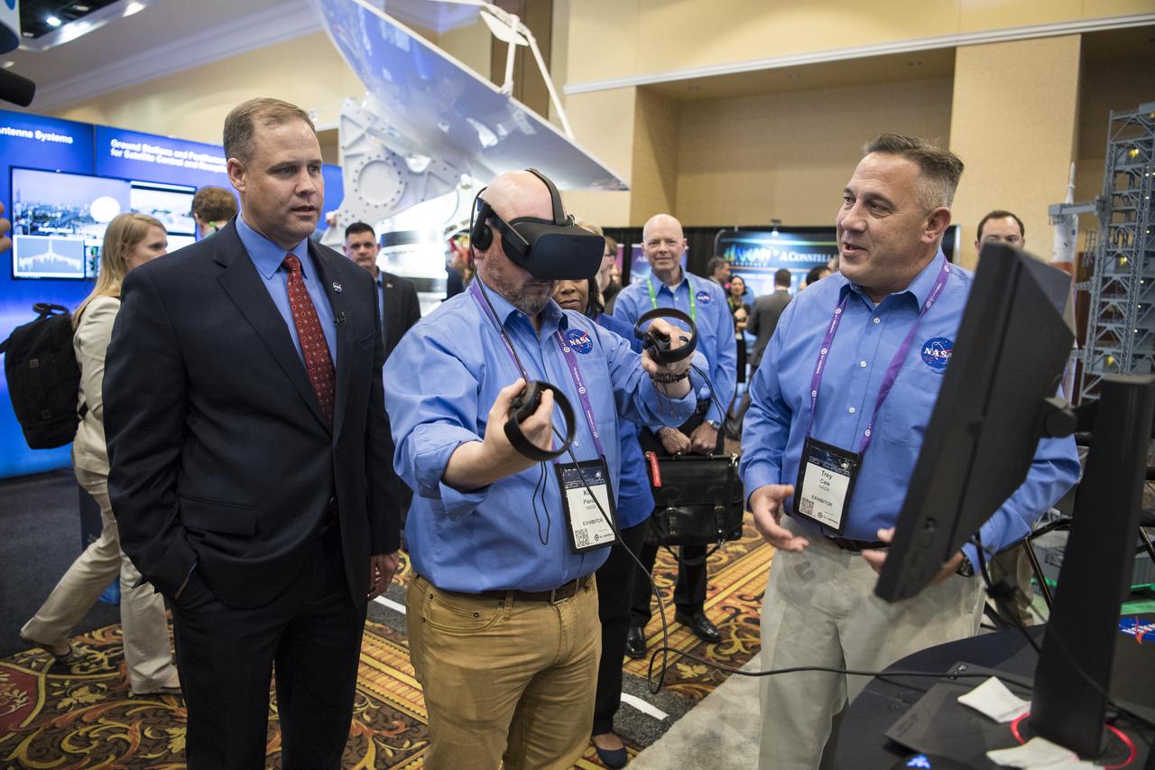 NASA Administrator Jim Bridenstine tours the NASA exhibit at the Space Symposium, Tuesday, April 9, 2019, at Broadmoor Hall in Colorado Springs, Colorado. Photo credit: (NASA/Aubrey Gemignani)