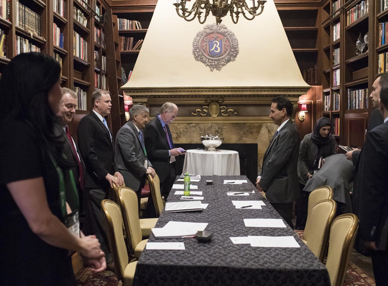 NASA Administrator Jim Bridenstine, third from left, speaks with the Director General of the United Arab Emirates Space Agency (UAESA), Dr. Mohamed Al Ahbabi, third from right, about NASA’s plans to land humans on the Moon by 2024, UAESA’S human spaceflight objectives, and prospective cooperation involving the International Space Station and exploration of the Moon and Mars, at the Space Symposium, Wednesday, April 10, 2019 in Colorado Springs, Colorado. Photo Credit: (NASA/Aubrey Gemignani)