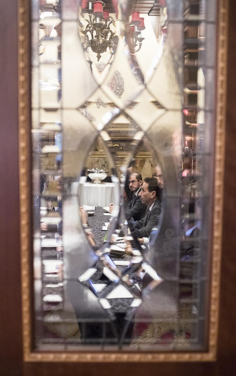 Director General of the United Arab Emirates Space Agency (UAESA), Dr. Mohamed Al Ahbabi, is seen through the door of the Pourtales Library speaking with NASA Administrator Jim Bridenstine about NASA’s plans to land humans on the Moon by 2024, UAESA’S human spaceflight objectives, and prospective cooperation involving the International Space Station and exploration of the Moon and Mars, at the Space Symposium, Wednesday, April 10, 2019 in Colorado Springs, Colorado. Photo Credit: (NASA/Aubrey Gemignani)