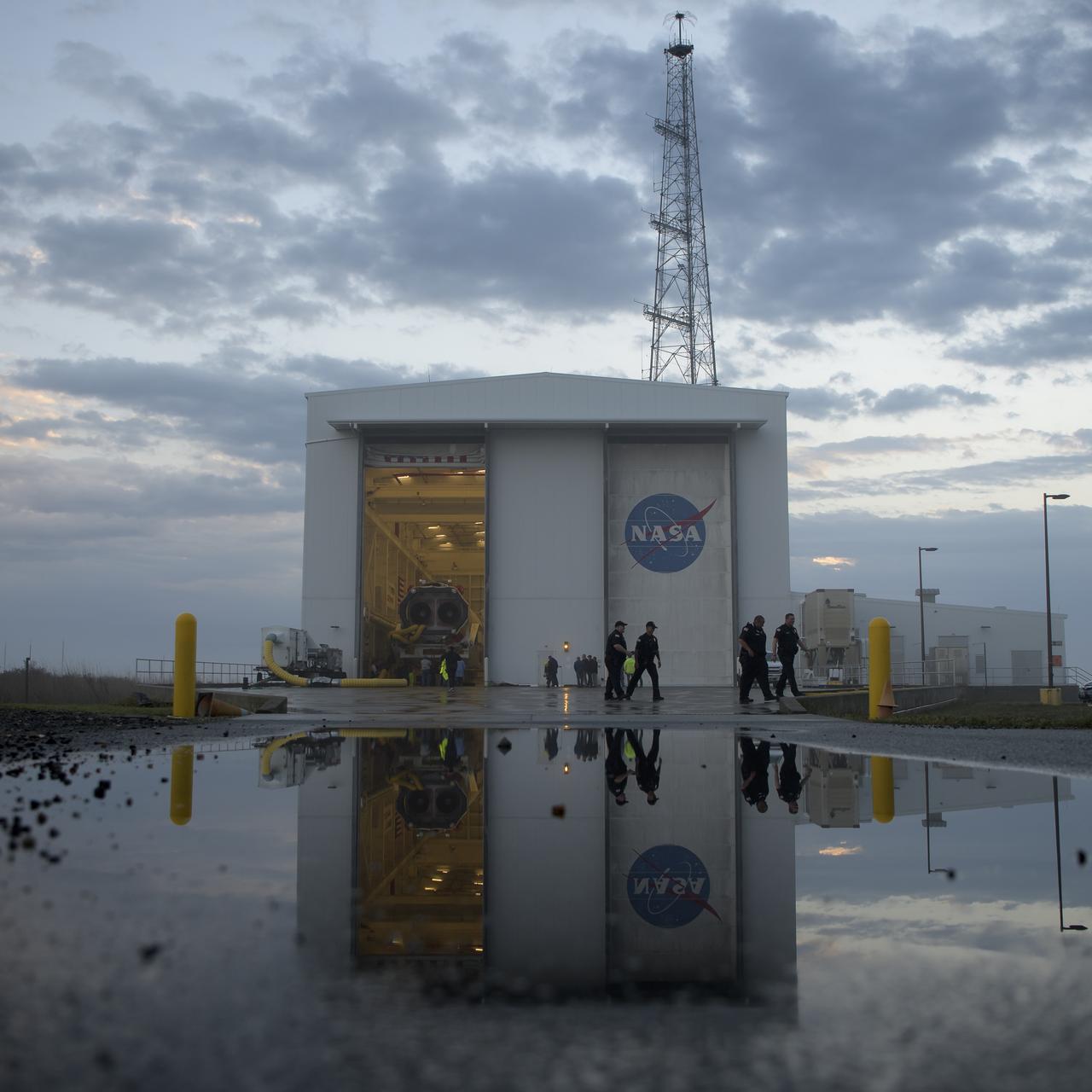 A Northrop Grumman Antares rocket is seen as it rolls out to Pad-0A, Monday, April 15, 2019 at NASA's Wallops Flight Facility in Virginia. Northrop Grumman’s 11th contracted cargo resupply mission with NASA to the International Space Station will deliver about 7,600 pounds of science and research, crew supplies and vehicle hardware to the orbital laboratory and its crew. Photo Credit: (NASA/Bill Ingalls)