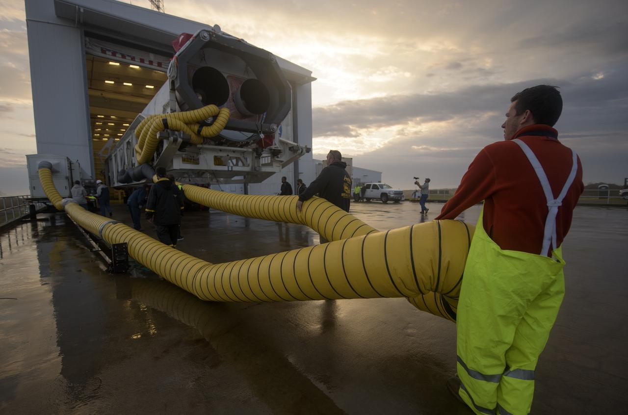 A Northrop Grumman Antares rocket is seen as it rolls out to Pad-0A, Monday, April 15, 2019 at NASA's Wallops Flight Facility in Virginia. Northrop Grumman’s 11th contracted cargo resupply mission with NASA to the International Space Station will deliver about 7,600 pounds of science and research, crew supplies and vehicle hardware to the orbital laboratory and its crew. Photo Credit: (NASA/Bill Ingalls)