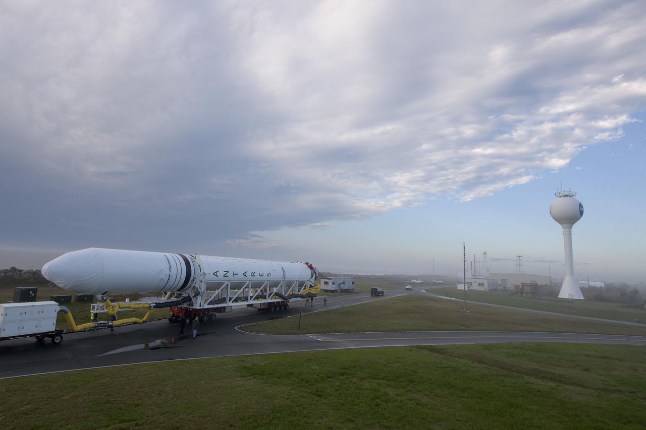 A Northrop Grumman Antares rocket is seen as it rolls out to Pad-0A, Monday, April 15, 2019 at NASA's Wallops Flight Facility in Virginia. Northrop Grumman’s 11th contracted cargo resupply mission with NASA to the International Space Station will deliver about 7,600 pounds of science and research, crew supplies and vehicle hardware to the orbital laboratory and its crew. Photo Credit: (NASA/Bill Ingalls)