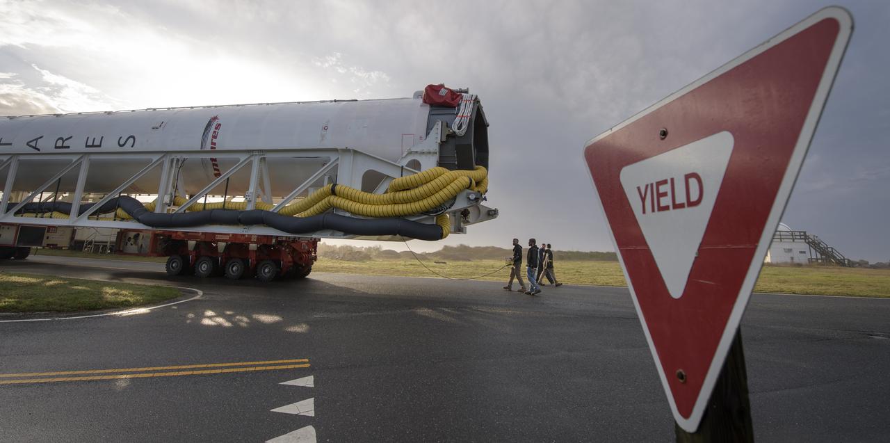 A Northrop Grumman Antares rocket is seen as it rolls out to Pad-0A, Monday, April 15, 2019 at NASA's Wallops Flight Facility in Virginia. Northrop Grumman’s 11th contracted cargo resupply mission with NASA to the International Space Station will deliver about 7,600 pounds of science and research, crew supplies and vehicle hardware to the orbital laboratory and its crew. Photo Credit: (NASA/Bill Ingalls)