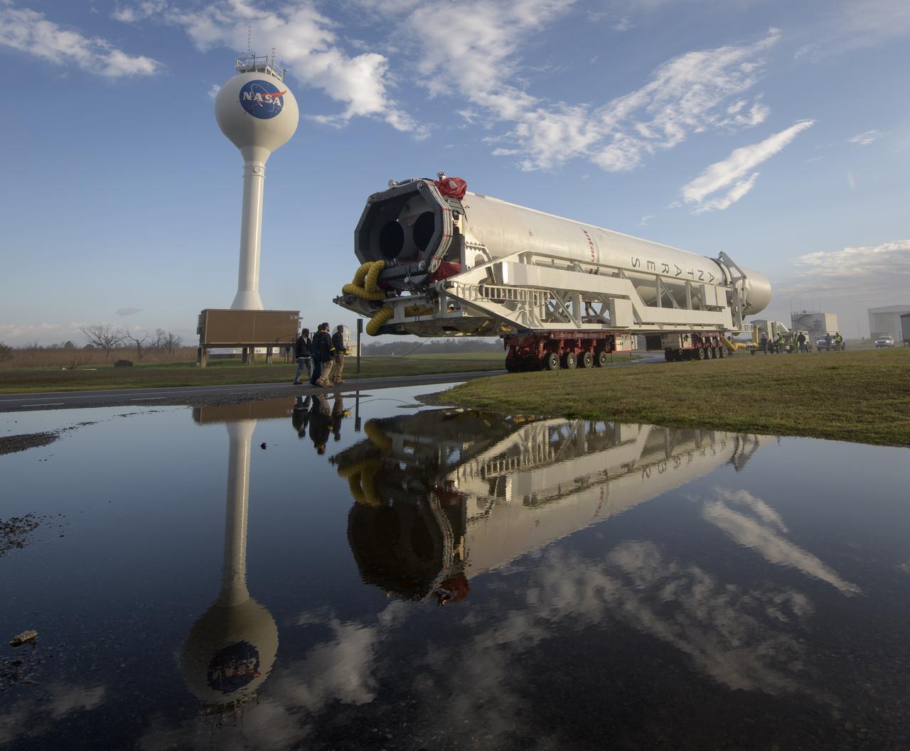 A Northrop Grumman Antares rocket is seen as it rolls out to Pad-0A, Monday, April 15, 2019 at NASA's Wallops Flight Facility in Virginia. Northrop Grumman’s 11th contracted cargo resupply mission with NASA to the International Space Station will deliver about 7,600 pounds of science and research, crew supplies and vehicle hardware to the orbital laboratory and its crew. Photo Credit: (NASA/Bill Ingalls)