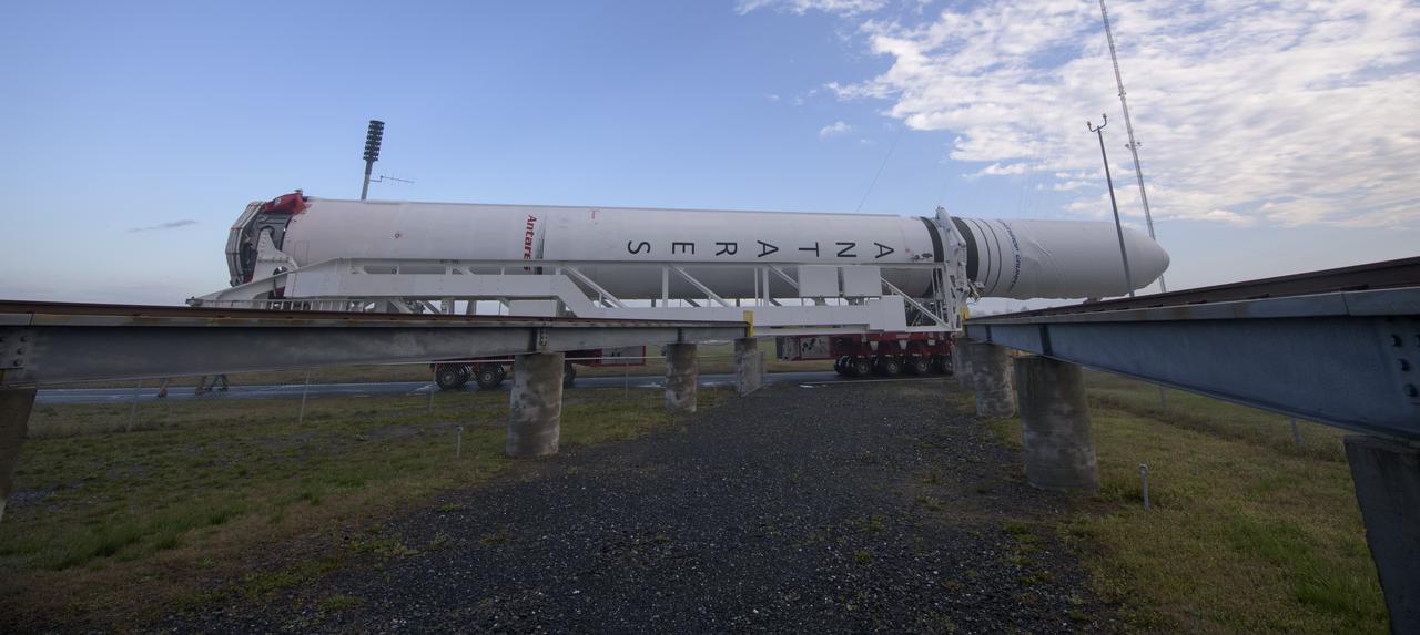 A Northrop Grumman Antares rocket is seen as it rolls out to Pad-0A, Monday, April 15, 2019 at NASA's Wallops Flight Facility in Virginia. Northrop Grumman’s 11th contracted cargo resupply mission with NASA to the International Space Station will deliver about 7,600 pounds of science and research, crew supplies and vehicle hardware to the orbital laboratory and its crew. Photo Credit: (NASA/Bill Ingalls)
