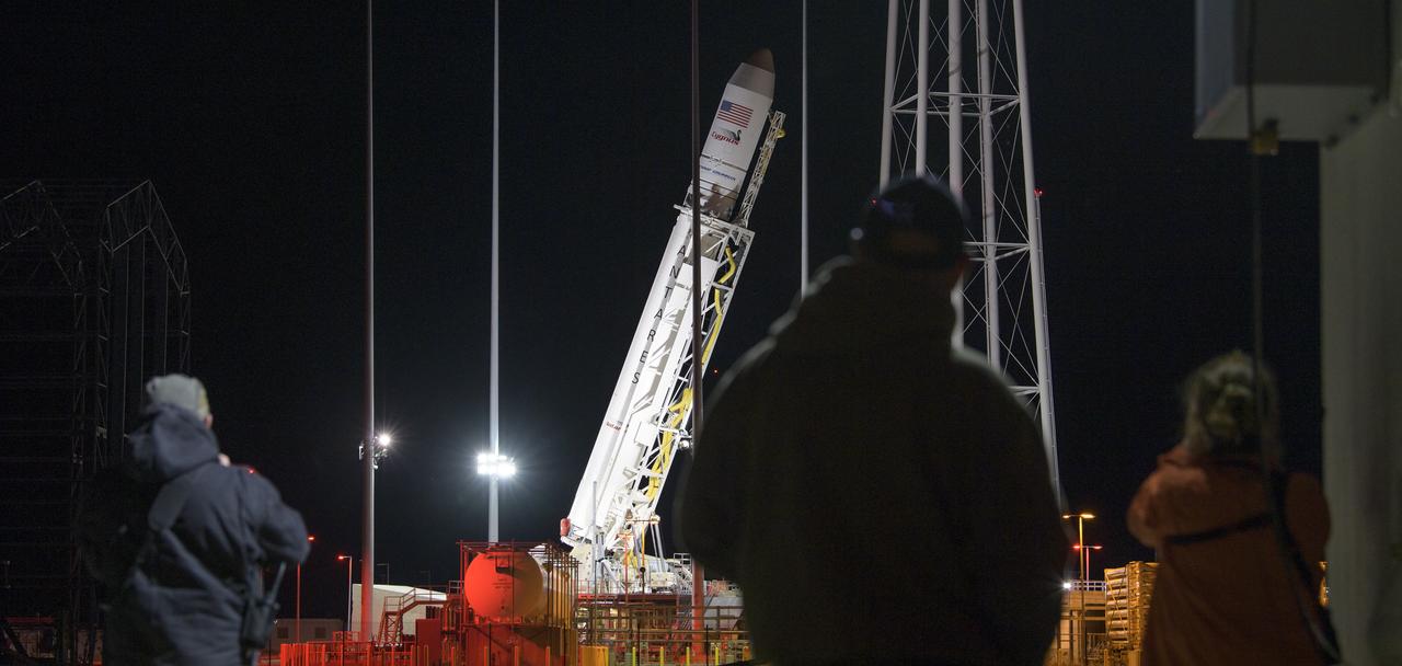 A Northrop Grumman Antares rocket carrying a Cygnus resupply spacecraft is raised into a vertical position on Pad-0A, Monday, April 15, 2019. Northrop Grumman’s 11th contracted cargo resupply mission with NASA to the International Space Station will deliver about 7,600 pounds of science and research, crew supplies and vehicle hardware to the orbital laboratory and its crew. Photo Credit: (NASA/Bill Ingalls)