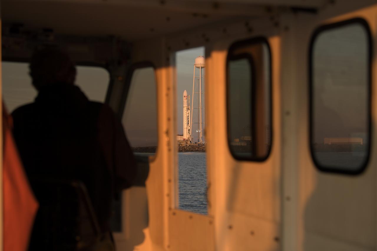 A Northrop Grumman Antares rocket carrying a Cygnus resupply spacecraft is seen during sunrise on Pad-0A, Tuesday, April 16, 2019 at NASA's Wallops Flight Facility in Virginia. Northrop Grumman’s 11th contracted cargo resupply mission with NASA to the International Space Station will deliver about 7,600 pounds of science and research, crew supplies and vehicle hardware to the orbital laboratory and its crew. Photo Credit: (NASA/Bill Ingalls)