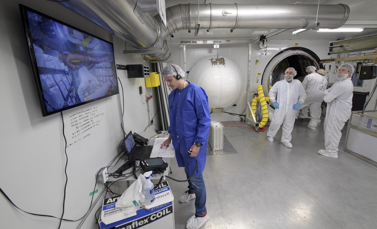 Mission engineers load the final cargo into the Cygnus resupply spacecraft onboard the Northrop Grumman Antares rocket, Tuesday, April 16, 2019 at launch Pad-0A of NASA's Wallops Flight Facility in Virginia. Northrop Grumman’s 11th contracted cargo resupply mission with NASA to the International Space Station will deliver about 7,600 pounds of science and research, crew supplies and vehicle hardware to the orbital laboratory and its crew. Photo Credit: (NASA/Bill Ingalls)