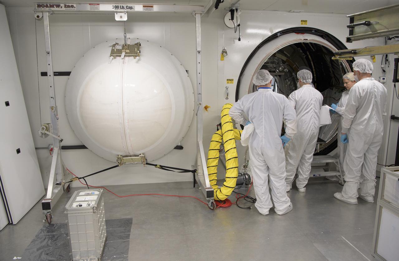Mission engineers load the final cargo into the Cygnus resupply spacecraft onboard the Northrop Grumman Antares rocket, Tuesday, April 16, 2019 at launch Pad-0A of NASA's Wallops Flight Facility in Virginia. Northrop Grumman’s 11th contracted cargo resupply mission with NASA to the International Space Station will deliver about 7,600 pounds of science and research, crew supplies and vehicle hardware to the orbital laboratory and its crew. Photo Credit: (NASA/Bill Ingalls)