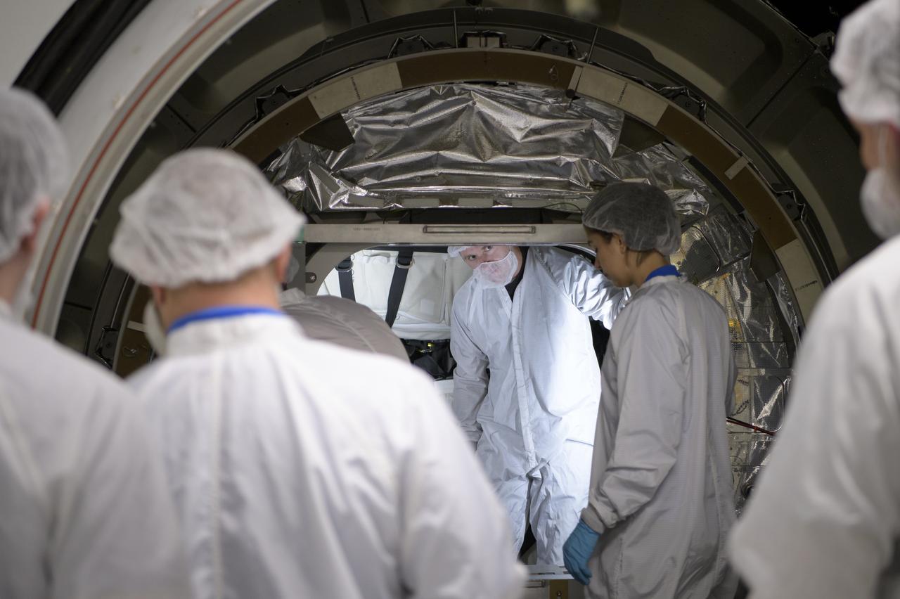 Mission engineers load the final cargo into the Cygnus resupply spacecraft onboard the Northrop Grumman Antares rocket, Tuesday, April 16, 2019 at launch Pad-0A of NASA's Wallops Flight Facility in Virginia. Northrop Grumman’s 11th contracted cargo resupply mission with NASA to the International Space Station will deliver about 7,600 pounds of science and research, crew supplies and vehicle hardware to the orbital laboratory and its crew. Photo Credit: (NASA/Bill Ingalls)