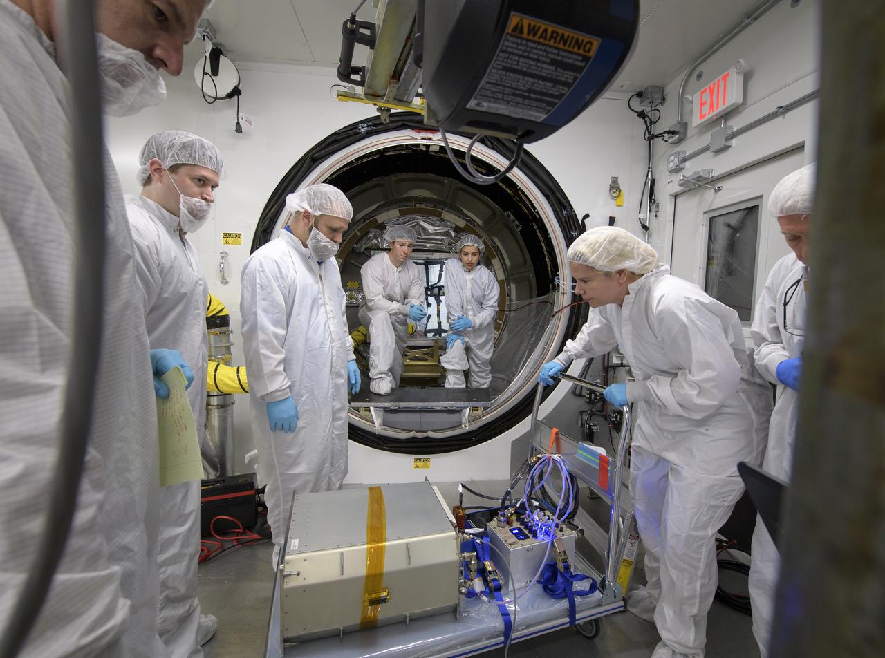 Mission engineers load the final cargo into the Cygnus resupply spacecraft onboard the Northrop Grumman Antares rocket, Tuesday, April 16, 2019 at launch Pad-0A of NASA's Wallops Flight Facility in Virginia. Northrop Grumman’s 11th contracted cargo resupply mission with NASA to the International Space Station will deliver about 7,600 pounds of science and research, crew supplies and vehicle hardware to the orbital laboratory and its crew. Photo Credit: (NASA/Bill Ingalls)