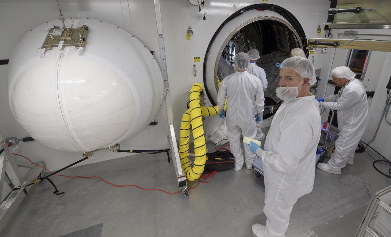 Mission engineers load the final cargo into the Cygnus resupply spacecraft onboard the Northrop Grumman Antares rocket, Tuesday, April 16, 2019 at launch Pad-0A of NASA's Wallops Flight Facility in Virginia. Northrop Grumman’s 11th contracted cargo resupply mission with NASA to the International Space Station will deliver about 7,600 pounds of science and research, crew supplies and vehicle hardware to the orbital laboratory and its crew. Photo Credit: (NASA/Bill Ingalls)