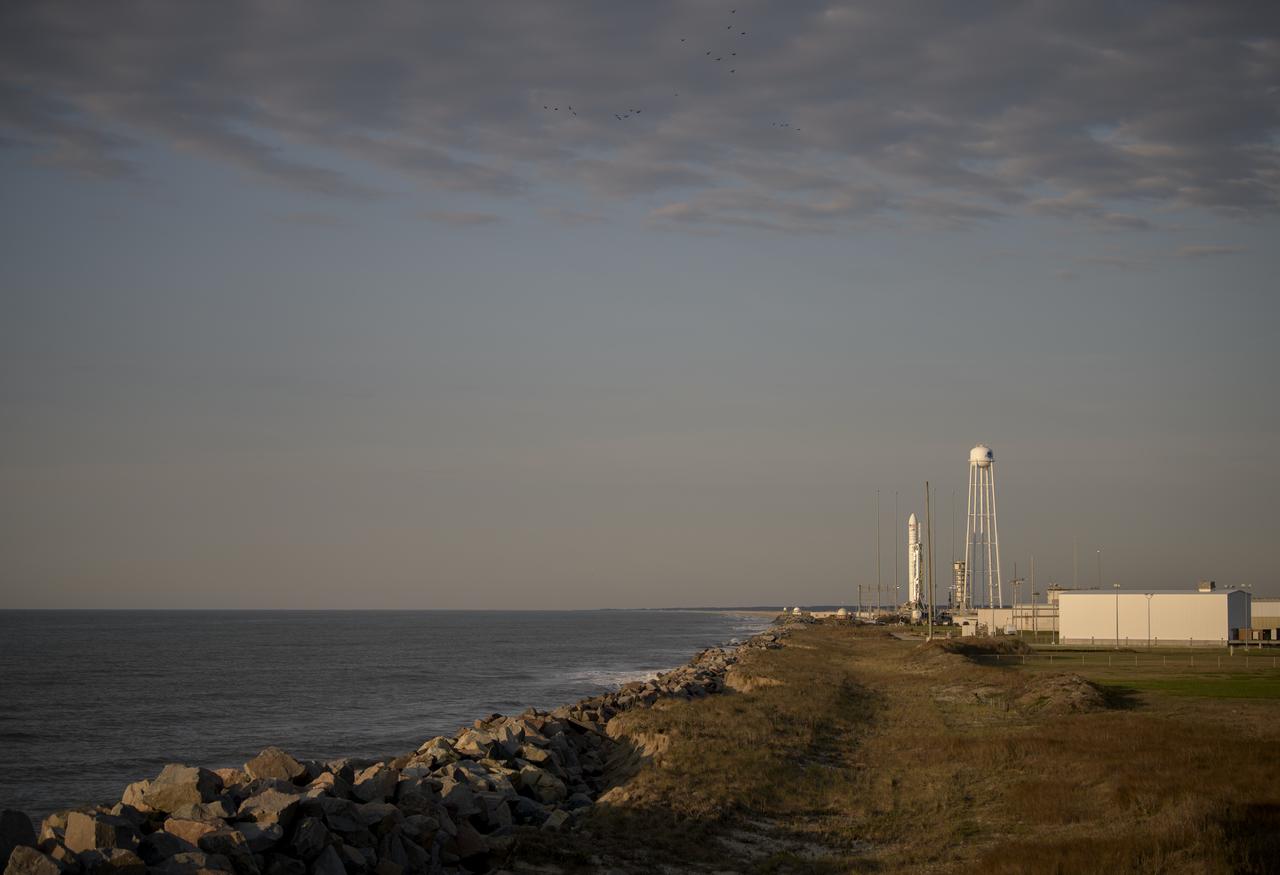 The Northrop Grumman Antares rocket, with Cygnus resupply spacecraft onboard, is seen just after sunrise on Pad-0A, Wednesday, April 17, 2019 at NASA's Wallops Flight Facility in Virginia. Northrop Grumman's 11th contracted cargo resupply mission for NASA to the International Space Station will deliver about 7,600 pounds of science and research, crew supplies and vehicle hardware to the orbital laboratory and its crew. Photo Credit: (NASA/Bill Ingalls)