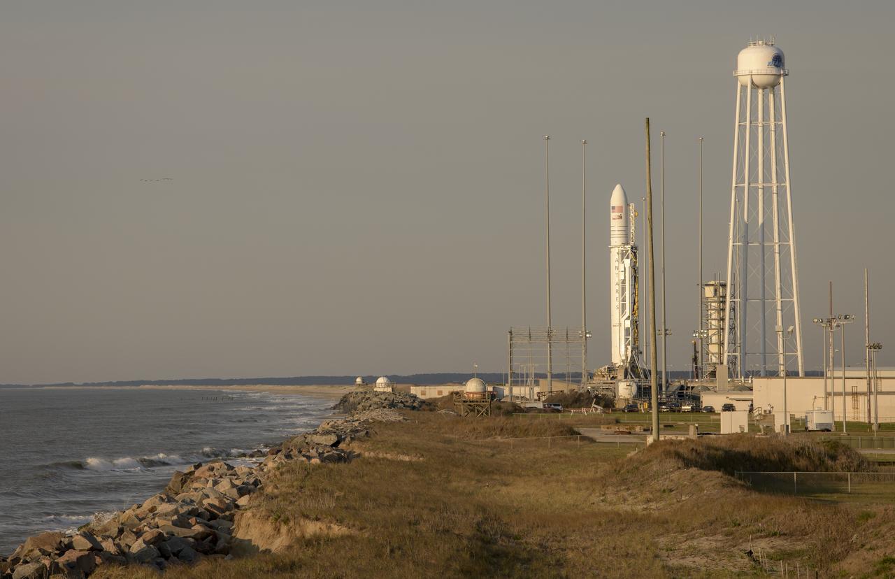 The Northrop Grumman Antares rocket, with Cygnus resupply spacecraft onboard, is seen just after sunrise on Pad-0A, Wednesday, April 17, 2019 at NASA's Wallops Flight Facility in Virginia. Northrop Grumman's 11th contracted cargo resupply mission for NASA to the International Space Station will deliver about 7,600 pounds of science and research, crew supplies and vehicle hardware to the orbital laboratory and its crew. Photo Credit: (NASA/Bill Ingalls)