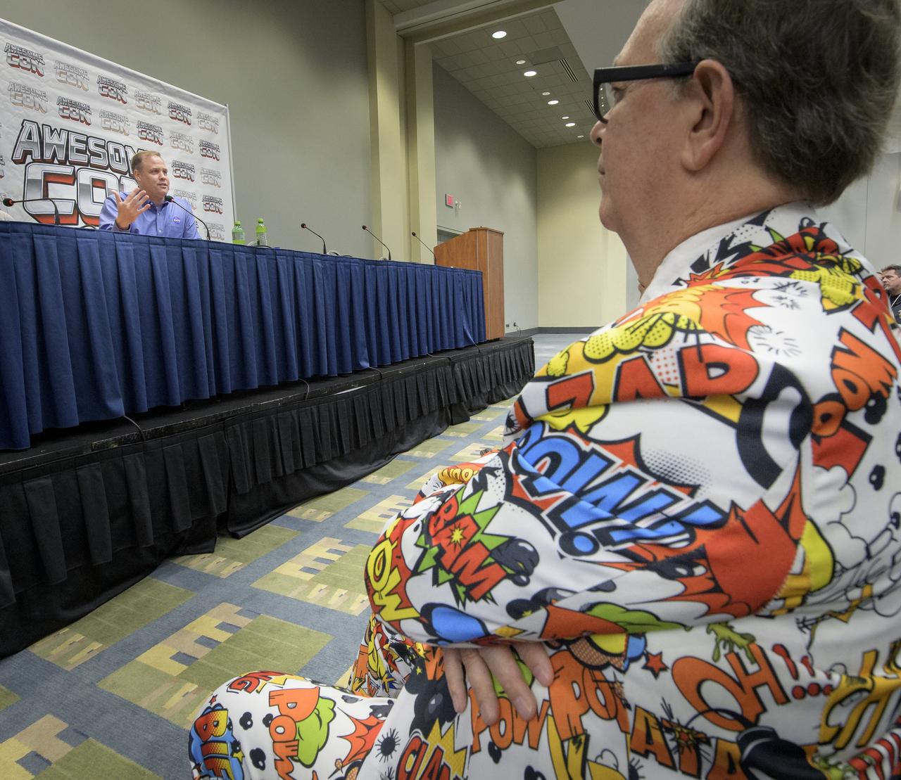 An audience member dressed in character listens as NASA Administrator Jim Bridenstine talks about getting American astronauts to the Moon in the next five years while participating in a Future Con panel discussion at Awesome Con, Saturday, April 27, 2019 at the Walter E. Washington Convention Center in Washington. Future Con highlights the intersection of science, technology, and science fiction inside D.C.’s largest pop culture event. Photo Credit: (NASA/Bill Ingalls)