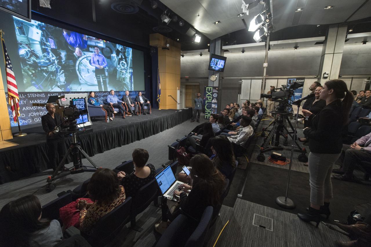Anne Marie Demme asks Nick Hague and Christina Koch, two astronauts currently living and working on the International Space Station, a question during a panel discussion with NASA Administrator Jim Bridenstine, NASA Associate Administrator for the Human Exploration and Operations Mission Directorate, Bill Gerstenmaier, and NASA Deputy Associate Administrator for Exploration, Steve Clarke at the "Future of Space" STEM event, Monday, April 29, 2019 at NASA Headquarters in Washington. NASA astronaut Tracy Caldwell Dyson, moderated the panel discussion. Photo Credit: (NASA/Aubrey Gemignani)