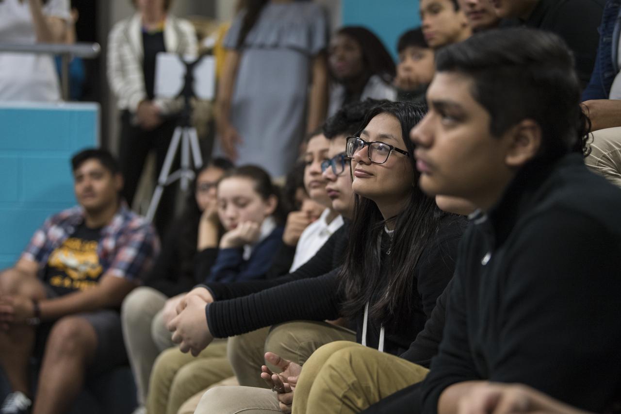 Students are seen in the audience as NASA astronaut Ricky Arnold speaks about his time onboard the International Space Station (ISS) during Expeditions 55 and 56, Friday, May 3, 2019 at the Challenger Center in Lanham, MD. During Expedition 55/56, Arnold completed three spacewalks for a total of 19.5 hours outside the space station, and concluded his 197 day mission when he landed in a remote area near the town of Zhezkazgan, Kazakhstan in Oct. 2018. He also flew to the space station on shuttle mission STS-119 to deliver the final pair of power-generating solar array wings. Photo Credit: (NASA/Aubrey Gemignani)