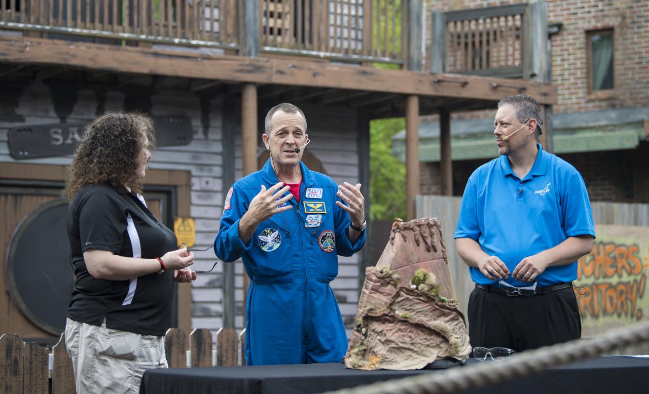 NASA astronaut Ricky Arnold answers questions from the audience about his time onboard the International Space Station (ISS) during a Smithsonian National Air and Space Museum production of Stem in 30, Friday, May 3, 2019 at Six Flags America theme park in Upper Marlboro, MD. During Expedition 55/56, Arnold completed three spacewalks for a total of 19.5 hours outside the space station, and concluded his 197 day mission when he landed in a remote area near the town of Zhezkazgan, Kazakhstan in Oct. 2018. He also flew to the space station on shuttle mission STS-119 to deliver the final pair of power-generating solar array wings. Photo Credit: (NASA/Aubrey Gemignani)