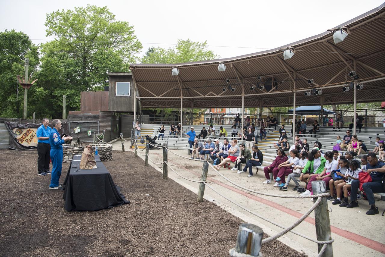 NASA astronaut Ricky Arnold answers questions from the audience about his time onboard the International Space Station (ISS) during a Smithsonian National Air and Space Museum production of Stem in 30, Friday, May 3, 2019 at Six Flags America theme park in Upper Marlboro, MD. During Expedition 55/56, Arnold completed three spacewalks for a total of 19.5 hours outside the space station, and concluded his 197 day mission when he landed in a remote area near the town of Zhezkazgan, Kazakhstan in Oct. 2018. He also flew to the space station on shuttle mission STS-119 to deliver the final pair of power-generating solar array wings. Photo Credit: (NASA/Aubrey Gemignani)