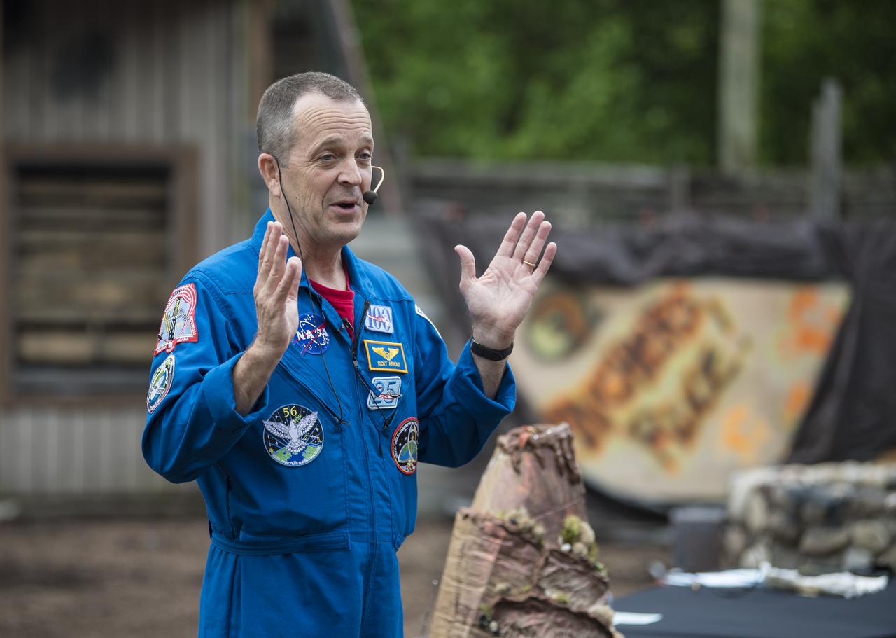 NASA astronaut Ricky Arnold answers questions from the audience about his time onboard the International Space Station (ISS) during a Smithsonian National Air and Space Museum production of Stem in 30, Friday, May 3, 2019 at Six Flags America theme park in Upper Marlboro, MD. During Expedition 55/56, Arnold completed three spacewalks for a total of 19.5 hours outside the space station, and concluded his 197 day mission when he landed in a remote area near the town of Zhezkazgan, Kazakhstan in Oct. 2018. He also flew to the space station on shuttle mission STS-119 to deliver the final pair of power-generating solar array wings. Photo Credit: (NASA/Aubrey Gemignani)