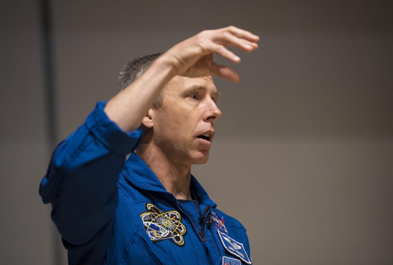 NASA astronaut Drew Feustel speaks about his experience on two shuttle missions, STS-125 and STS-134, as well as Expeditions 55 and 56 on the International Space Station, at Northern Virginia Community College's Alexandria campus, Monday, May 6, 2019 in Virginia. Photo Credit: (NASA/Aubrey Gemignani)