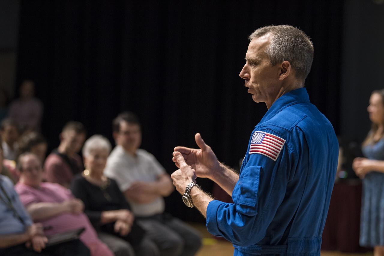 NASA astronaut Drew Feustel speaks about his experience on two shuttle missions, STS-125 and STS-134, as well as Expeditions 55 and 56 on the International Space Station, at Northern Virginia Community College's Alexandria campus, Monday, May 6, 2019 in Virginia. Photo Credit: (NASA/Aubrey Gemignani)
