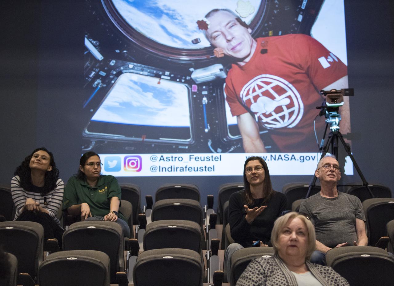 An audience member asks a question after NASA astronaut Drew Feustel gave a presentation about his experience on two shuttle missions, STS-125 and STS-134, as well as Expeditions 55 and 56 on the International Space Station, at Northern Virginia Community College's Alexandria campus, Monday, May 6, 2019 in Virginia. Photo Credit: (NASA/Aubrey Gemignani)