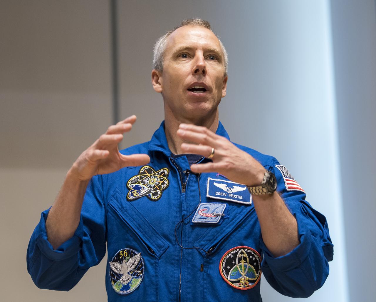 NASA astronaut Drew Feustel speaks about his experience on two shuttle missions, STS-125 and STS-134, as well as Expeditions 55 and 56 on the International Space Station, at Northern Virginia Community College's Alexandria campus, Monday, May 6, 2019 in Virginia. Photo Credit: (NASA/Aubrey Gemignani)