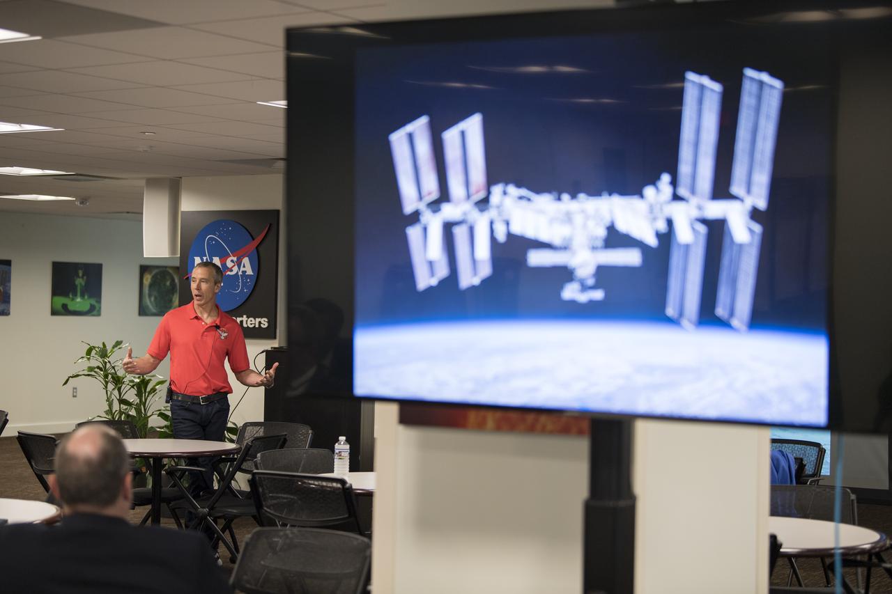 NASA astronaut Drew Feustel speaks about his experience on two space shuttle missions, STS-125 and STS-134, and a long duration mission onboard the International Space Station at NASA Headquarters, Thursday, May 9, 2019 in Washington, DC. Feustel most recently spent 197 days living and working onboard the International Space Station as part of Expedition 55 and as commander of Expedition 56. Feustel ventured outside the space station on three spacewalks, moving him up to second among U.S. spacewalkers with a cumulative time of 61 hours 48 minutes over nine spacewalks. Photo Credit: (NASA/Aubrey Gemignani)
