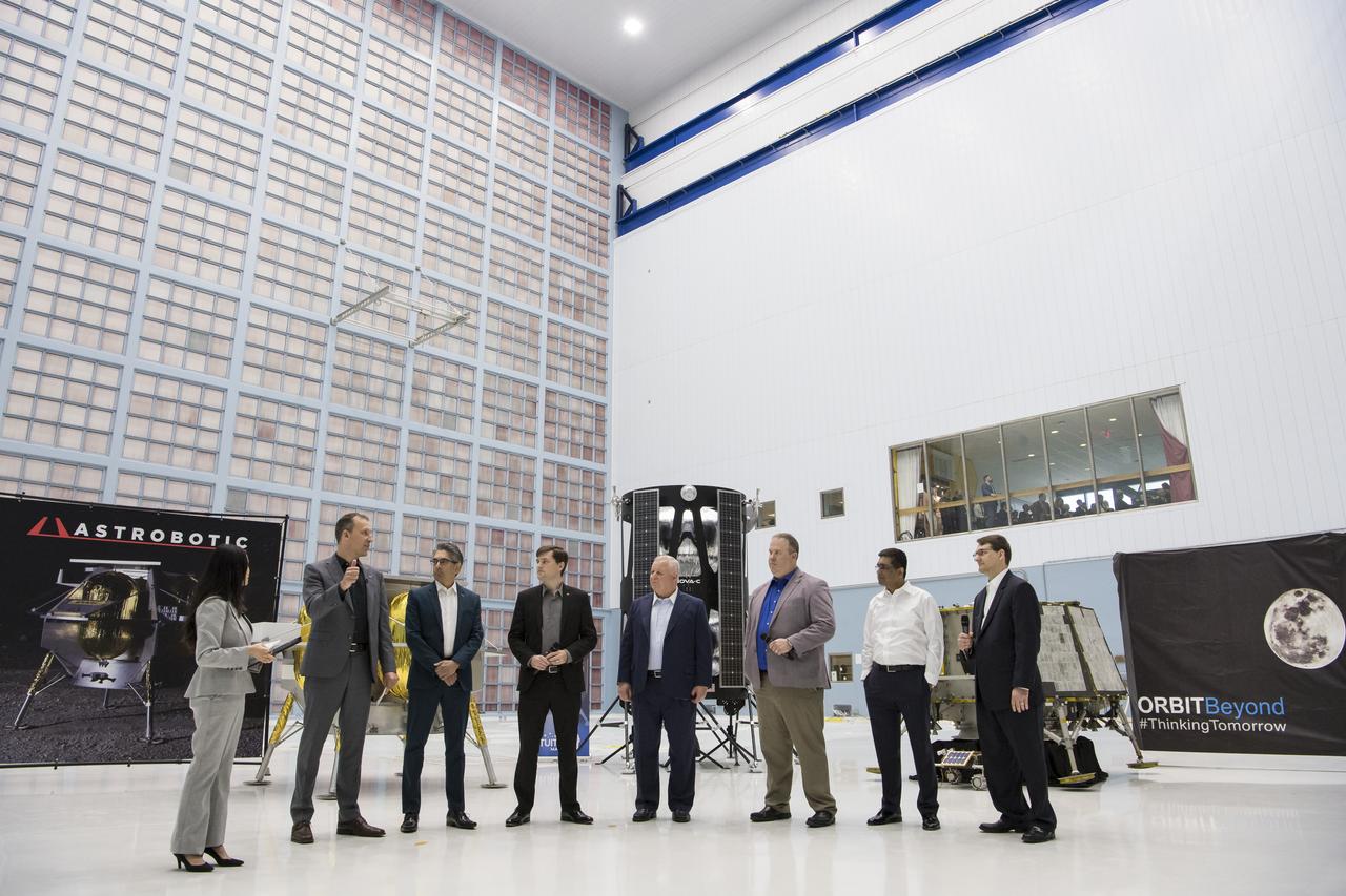 From left to right, NASA Press Officer, Felicia Chou; NASA Associate Administrator, Science Mission Directorate, Thomas Zurbuchen; Astrobotic Mission Director, Sharad Bhaskaran; Astrobotic CEO, John Thornton; Chairman of the Board of Intuitive Machines, Kam Ghaffarian; VP of Research and Development of Intuitive Machines, Tim Crain; President and CEO of OrbitBeyond, Siba Padhi; and Chief Science Officer, OrbitBeyond, Jon Morse talk about their lunar landers, Friday, May 31, 2019, at Goddard Space Flight Center in Md. Astrobotic, Intuitive Machines, and OrbitBeyond have been selected to provide the first lunar landers for the Artemis program's lunar surface exploration. Photo credit: (NASA/Aubrey Gemignani)