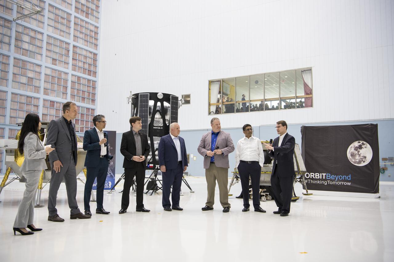 Chief Science Officer, OrbitBeyond, Jon Morse speaks about their lunar lander with, from left to right, NASA Press Officer, Felicia Chou; NASA Associate Administrator, Science Mission Directorate, Thomas Zurbuchen; Astrobotic Mission Director, Sharad Bhaskaran; Astrobotic CEO, John Thornton; Chairman of the Board of Intuitive Machines, Kam Ghaffarian; VP of Research and Development of Intuitive Machines, Tim Crain; President and CEO of OrbitBeyond, Siba Padhi, Friday, May 31, 2019, at Goddard Space Flight Center in Md. Astrobotic, Intuitive Machines, and OrbitBeyond have been selected to provide the first lunar landers for the Artemis program's lunar surface exploration. Photo credit: (NASA/Aubrey Gemignani)