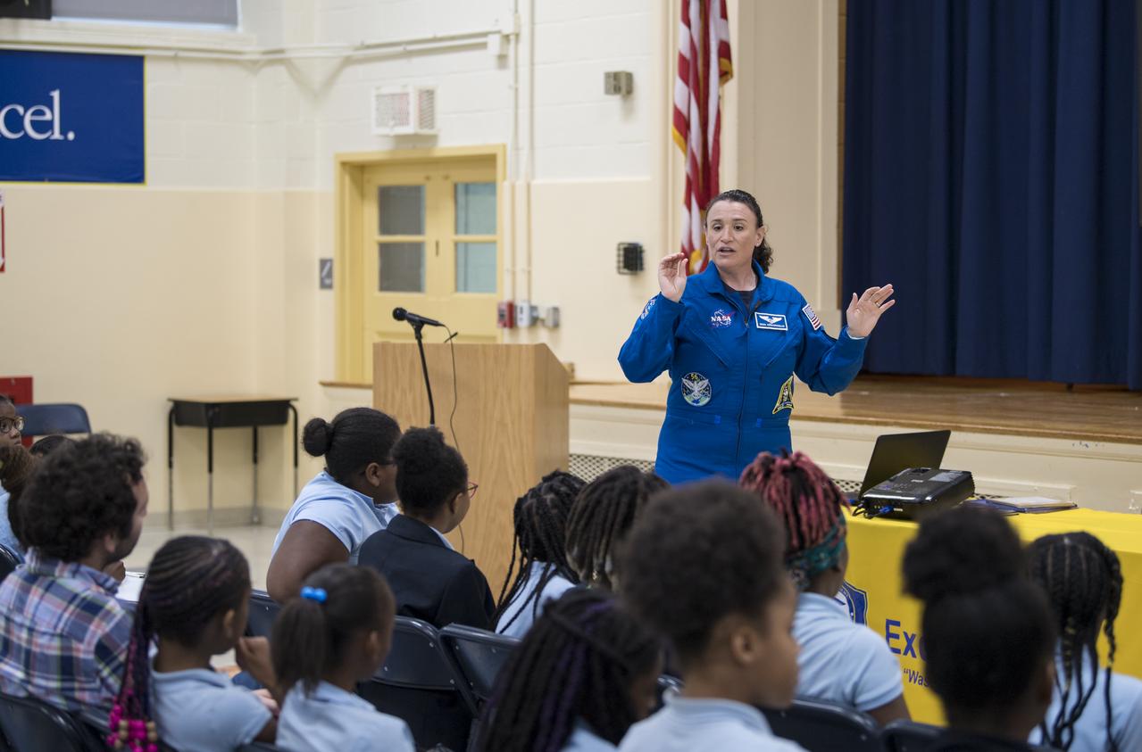 NASA astronaut Dr. Serena Auñón-Chancellor speaks about her experience on Expeditions 56 and 57 onboard the International Space Station (ISS) at Excel Academy Public Charter School, Monday, June 10, 2019 in Washington, DC. Auñón-Chancellor spent 197 days living and working onboard the ISS and contributed to hundreds of experiments in biology, biotechnology, physical science, and Earth science while there. She is also a doctor and started her career with NASA as a flight surgeon in 2006. Photo Credit: (NASA/Aubrey Gemignani)