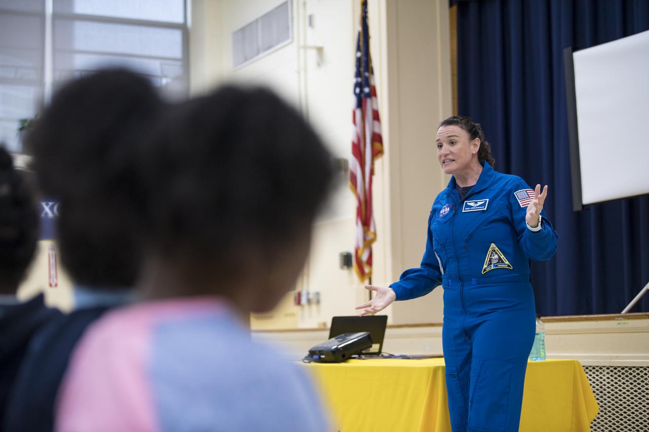 NASA astronaut Dr. Serena Auñón-Chancellor speaks about her experience on Expeditions 56 and 57 onboard the International Space Station (ISS) at Excel Academy Public Charter School, Monday, June 10, 2019 in Washington, DC. Auñón-Chancellor spent 197 days living and working onboard the ISS and contributed to hundreds of experiments in biology, biotechnology, physical science, and Earth science while there. She is also a doctor and started her career with NASA as a flight surgeon in 2006. Photo Credit: (NASA/Aubrey Gemignani)
