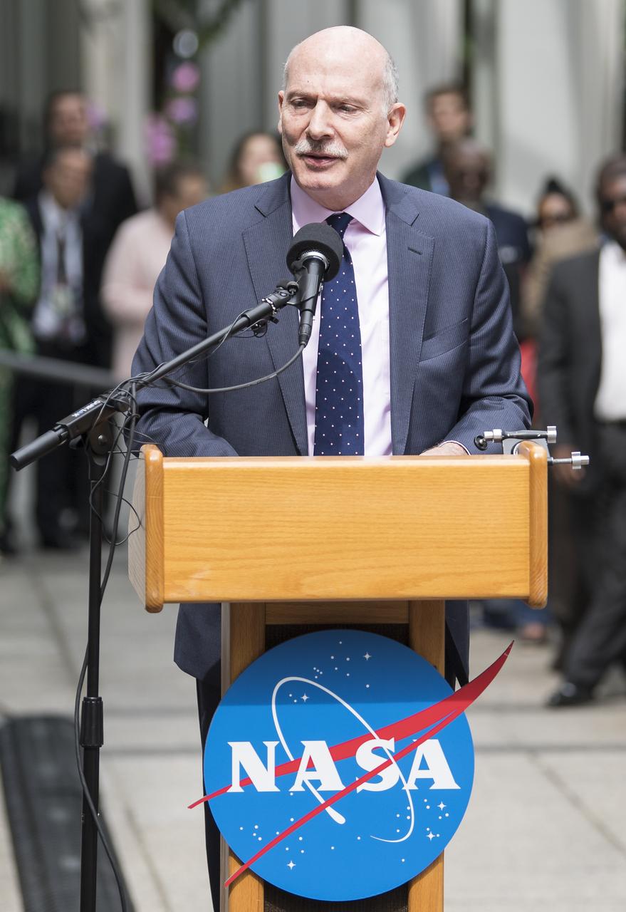 D.C. Council Chairman Phil Mendelson delivers remarks during the dedication ceremony for "Hidden Figures Way," Wednesday, June 12, 2019 at NASA Headquarters in Washington, DC. The 300 block of E Street SW in front of the NASA Headquarters building was designated as "Hidden Figures Way" to honor Katherine Johnson, Dorothy Vaughan, Mary Jackson and all women who have dedicated their lives to honorably serving their country, advancing equality, and contributing to the space program of the United States. Photo Credit: (NASA/Joel Kowsky)