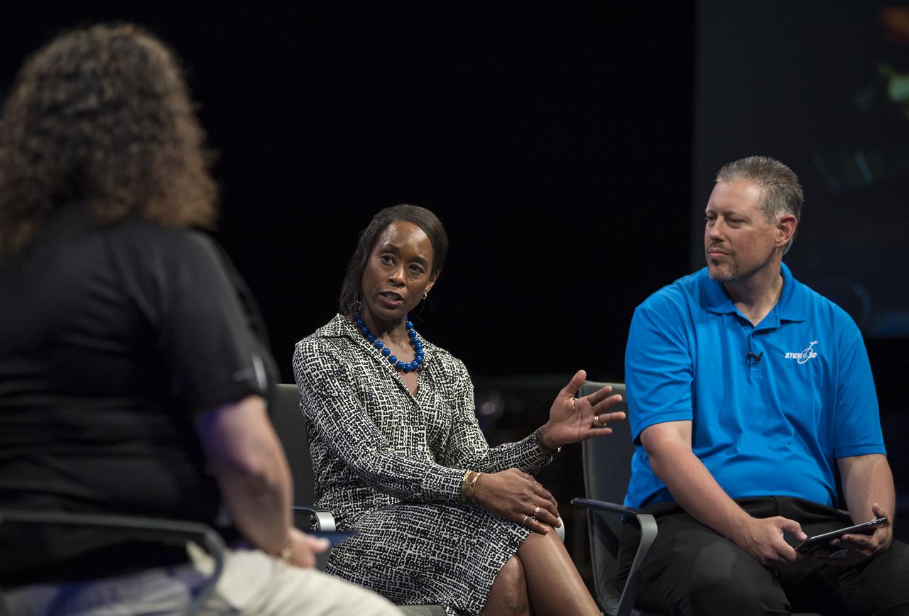 "Hidden Figures" author, Margot Lee Shetterly speaks during a "Hidden Figures" panel discussion with NASA human computer Christine Darden, Marty Kelsey, right,  and Beth Wilson, left, of STEM in 30, Wednesday, June 12, 2019 at the Smithsonian National Air and Space Museum in Washington. The panel discussion took place after a ceremony dedicating the 300 block of E Street SW as "Hidden Figures Way" to honor Katherine Johnson, Dorthy Vaughan, Mary Jackson and all of the women who have dedicated their lives to honorably serving their country, advancing equality, and contributing to the space program of the United States. Photo Credit: (NASA/Aubrey Gemignani)