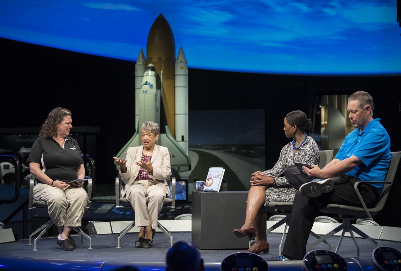 NASA human computer Christine Darden, second from left, speaks during a "Hidden Figures" panel discussion with "Hidden Figures" author, Margot Lee Shetterly, second from right, and Beth Wilson, left, and Marty Kelsey, right, of STEM in 30, Wednesday, June 12, 2019 at the Smithsonian National Air and Space Museum in Washington. The panel discussion took place after a ceremony dedicating the 300 block of E Street SW as "Hidden Figures Way" to honor Katherine Johnson, Dorthy Vaughan, Mary Jackson and all of the women who have dedicated their lives to honorably serving their country, advancing equality, and contributing to the space program of the United States. Photo Credit: (NASA/Aubrey Gemignani)