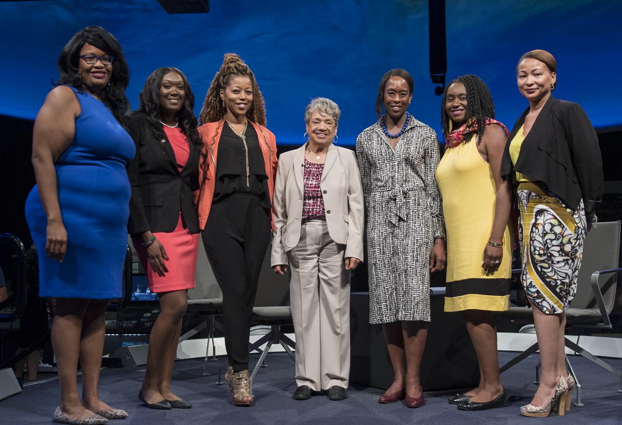 NASA human computer Christine Darden, center, and "Hidden Figures" author, Margot Lee Shetterly, third from right, pose for a group photo with NASA Social members and Aubree Hill, right, after a "Hidden Figures" panel discussion with Beth Wilson and Marty Kelsey of STEM in 30, Wednesday, June 12, 2019 at the Smithsonian National Air and Space Museum in Washington. The panel discussion took place after a ceremony dedicating the 300 block of E Street SW as "Hidden Figures Way" to honor Katherine Johnson, Dorthy Vaughan, Mary Jackson and all of the women who have dedicated their lives to honorably serving their country, advancing equality, and contributing to the space program of the United States. Photo Credit: (NASA/Aubrey Gemignani)