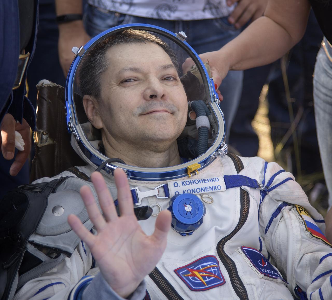 Expedition 59 crew member Oleg Kononenko of Roscosmos is seen outside the Soyuz MS-11 spacecraft after he, NASA astronaut Anne McClain, and Canadian Space Agency astronaut David Saint-Jacques landed in a remote area near the town of Zhezkazgan, Kazakhstan on Tuesday, June 25, 2019 Kazakh time (June 24 Eastern time). McClain, Saint-Jacques, and Kononenko are returning after 204 days in space where they served as members of the Expedition 58 and 59 crews onboard the International Space Station. Photo Credit: (NASA/Bill Ingalls)