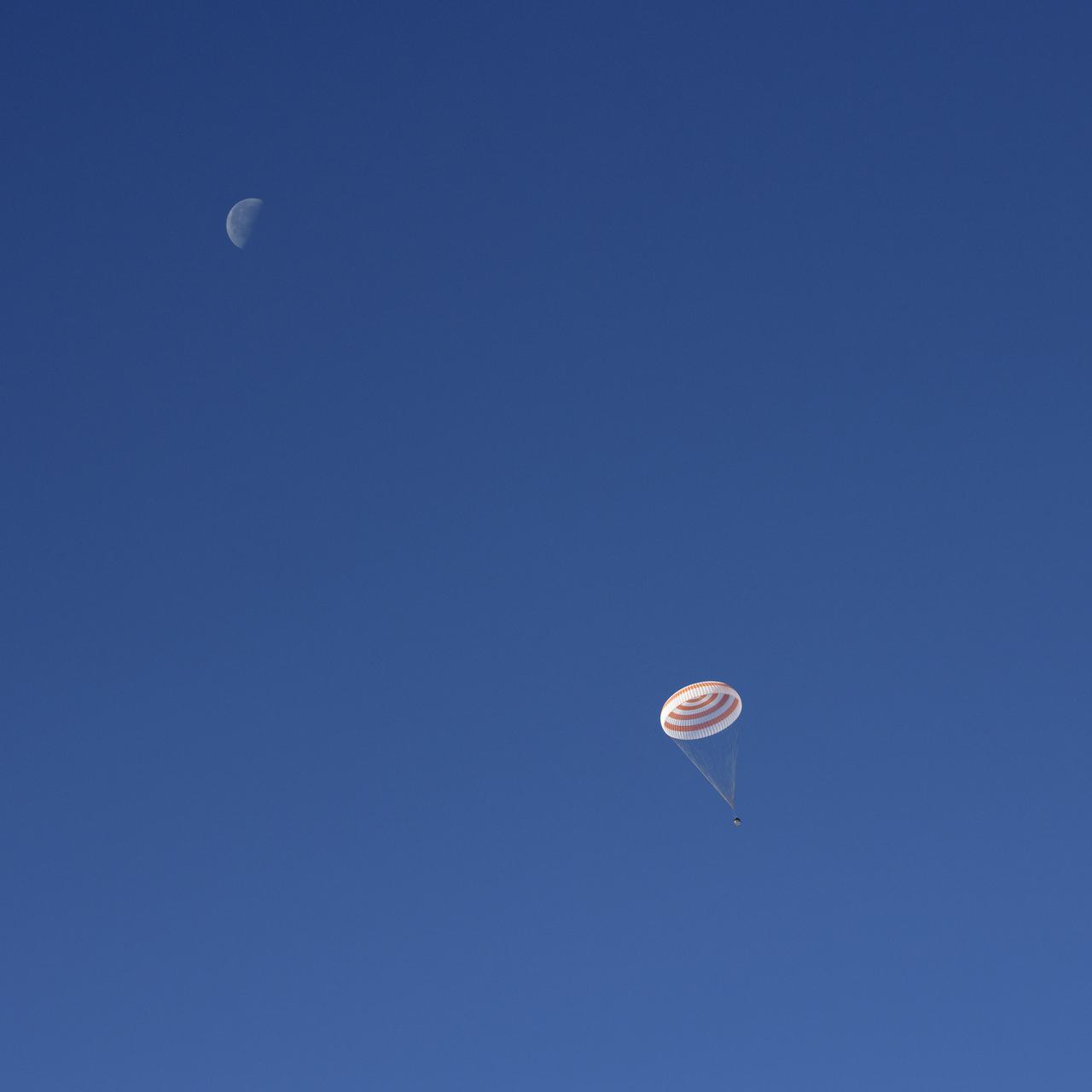 The Soyuz MS-11 spacecraft is seen as it lands in a remote area near the town of Zhezkazgan, Kazakhstan with Expedition 59 crew members Anne McClain of NASA, David Saint-Jacques of the Canadian Space Agency, and Oleg Kononenko of Roscosmos, Tuesday, June 25, 2019 Kazakh time (June 24 Eastern time). McClain, Saint-Jacques, and Kononenko are returning after 204 days in space where they served as members of the Expedition 58 and 59 crews onboard the International Space Station. Photo Credit: (NASA/Bill Ingalls)